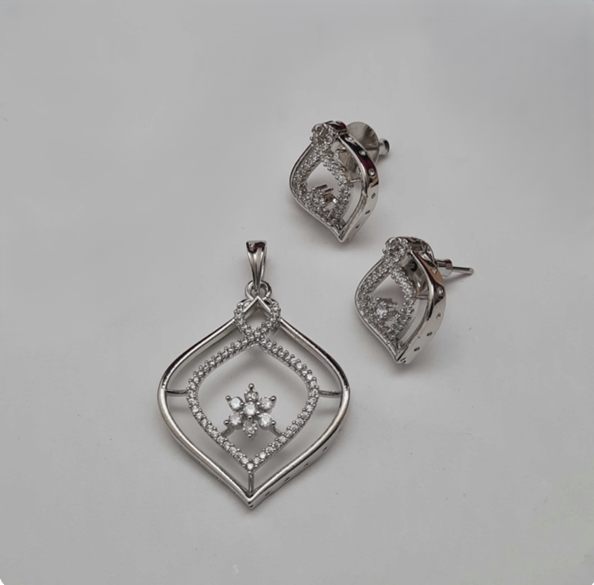 Close-up of rhodium-plated pendant with sparkling white cubic zirconia stones