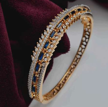 Lux kada on red velvet background – GJ plated blue and CZ bracelet