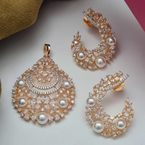 Faux Pearl CZ Pendant Set with matching crescent earrings – gold-plated brass with white pearls on fabric background