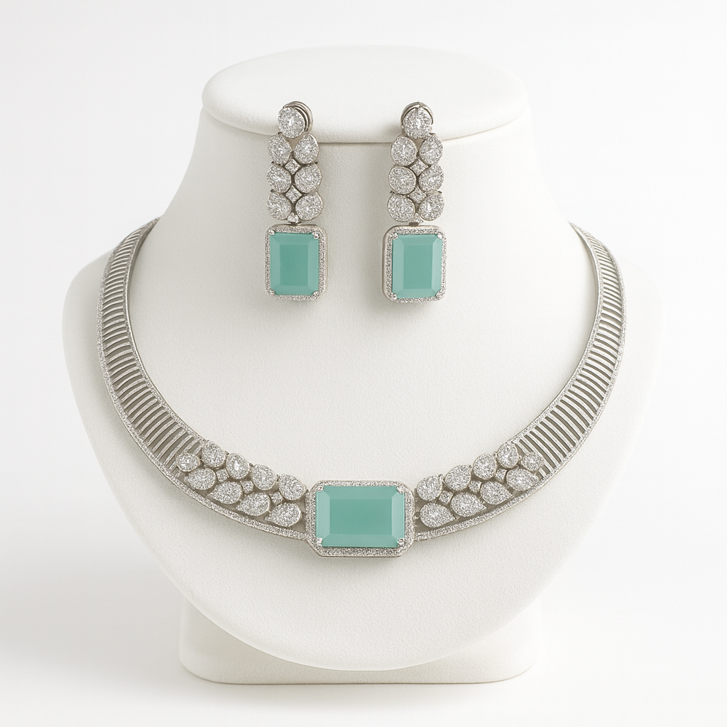 Front view of Sera necklace set on white bust with silver and mint finish
