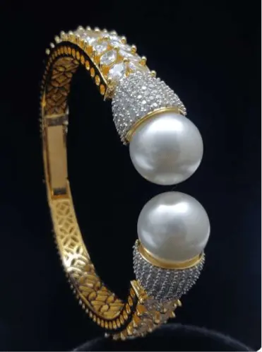 Aurea Gold – Pearl Elegant AD Kada - LAVISH JEWELSAurea Gold – Pearl Elegant AD Kada | Gold White Plated Dual Pearl Bangle
