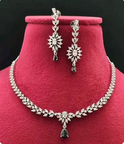 Tesoro Mio Black AD Necklace Set - LAVISH JEWELSTesoro Mio Black AD Necklace Set – Delicate Design, Golden White Finish | Lavish Jewels