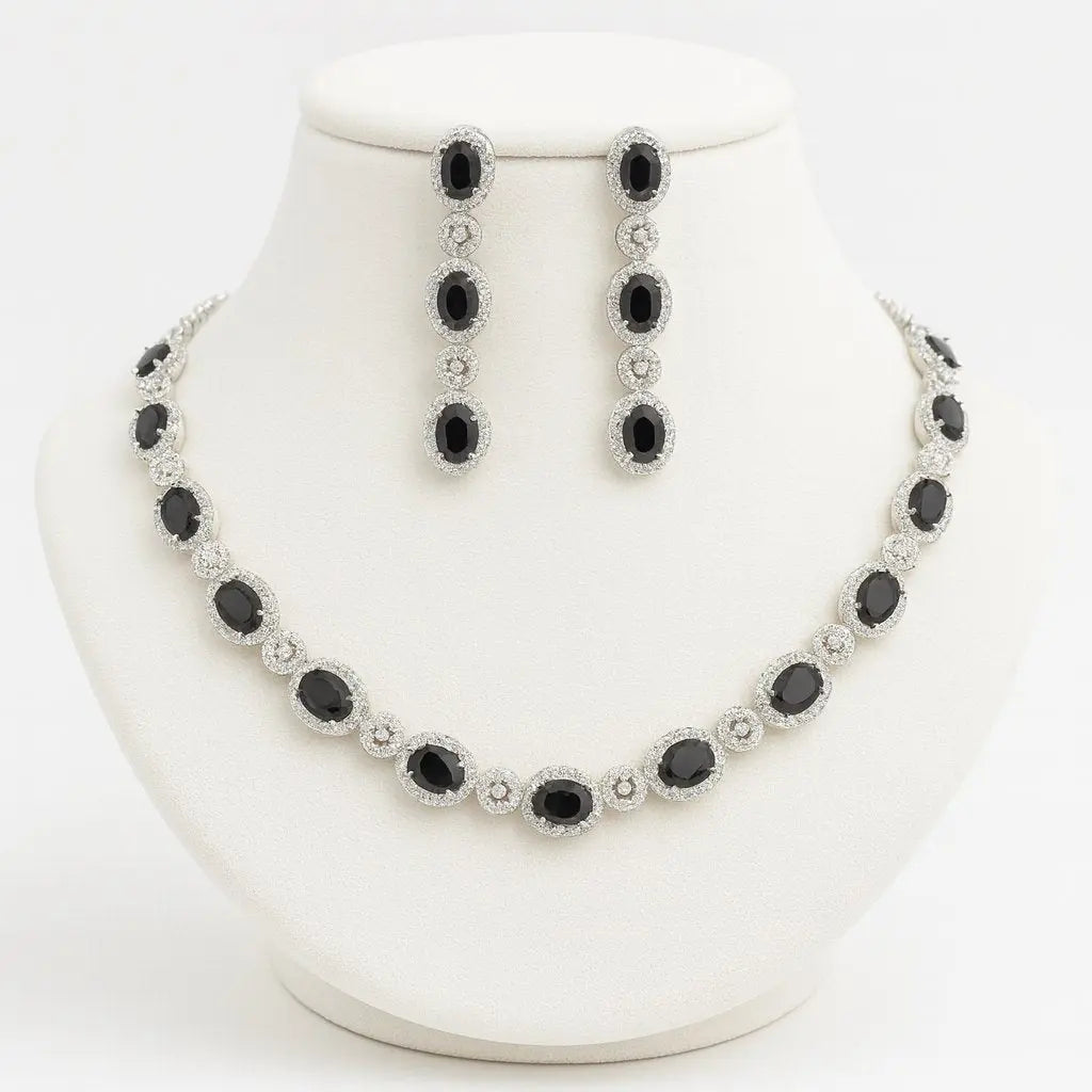 Solitaire CZ necklace & earrings in silver finish for elegant styling.
