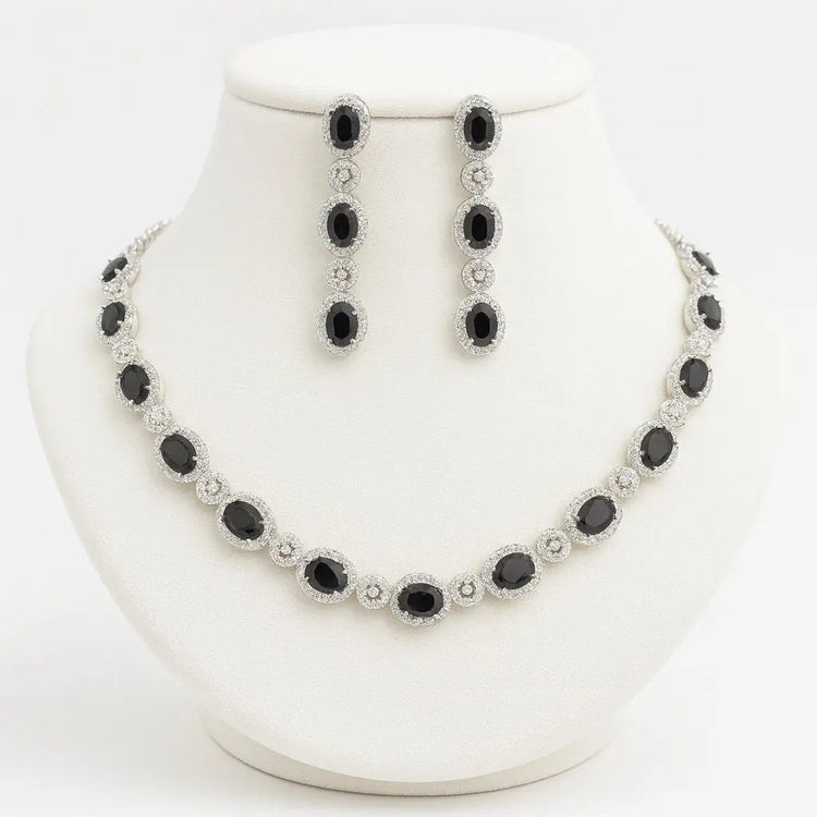 Solitaire CZ necklace & earrings in silver finish for elegant styling.