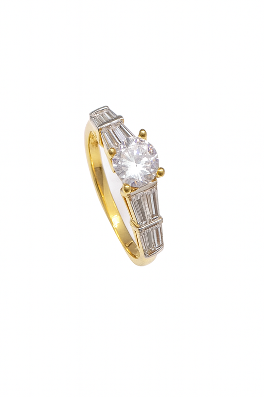 Studio shot of Anello Luce ring with central round CZ and baguette accents