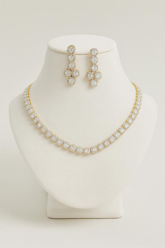 “Luce gold white delicate AD necklace set with matching earrings on white bust stand – Lavish Jewels”