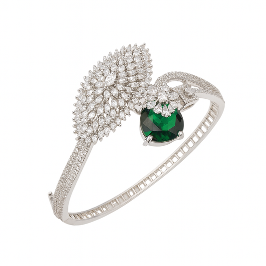 Studio shot of Verina Glace kada – rhodium plated with green centre stone