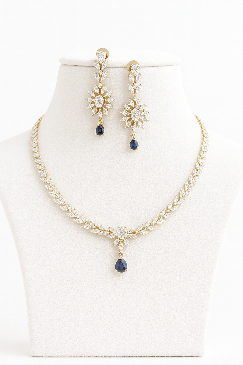 Blue AD necklace set with golden white finish, featuring a 20 cm delicate necklace and 5 cm earrings. Elegant festive and gifting jewelry by Lavish Jewels.