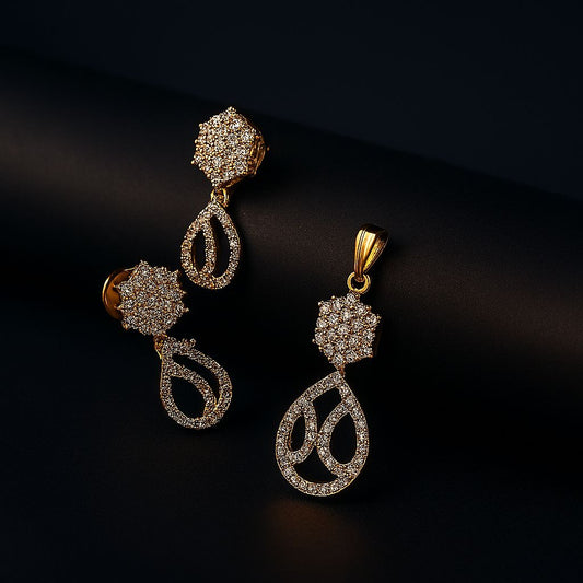 Elegant CZ Golden Pendant Set (no chain) – luxury jewellery photo on black matte cylindrical surface with soft lighting