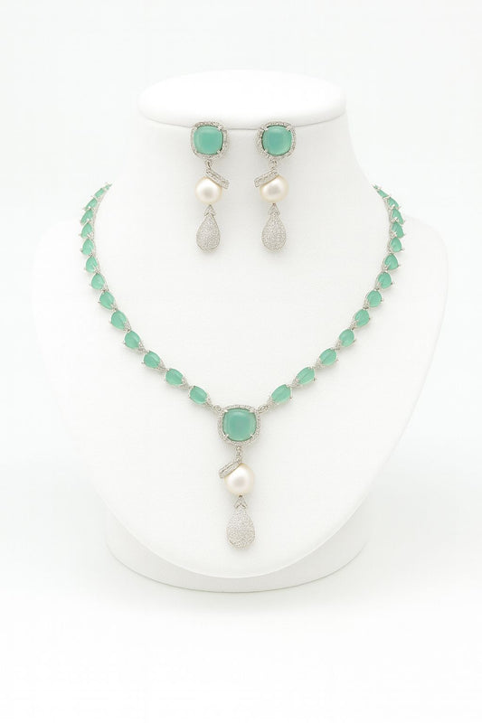  Marina mint AD necklace set with pearl drop earrings shown on white bust stand