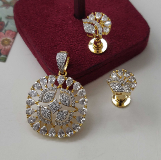 GLITTERING CZ Pendant Set Golden with earrings on red display – no chain included