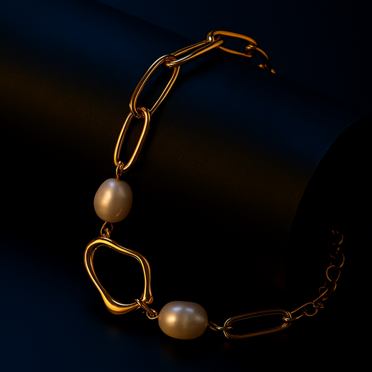 Gold bracelet with pearls on a dark background