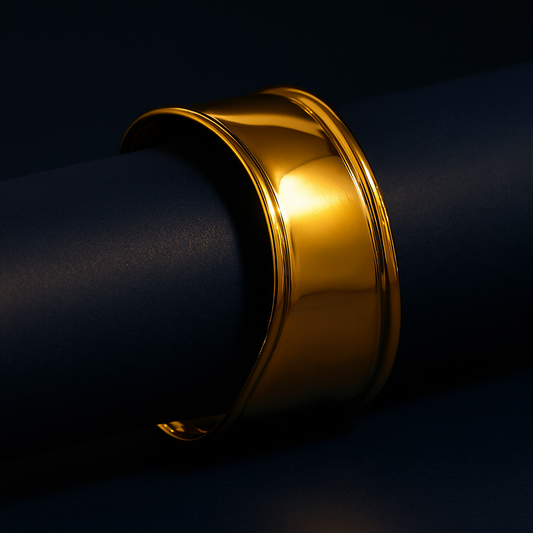 Gold bracelet on a black background