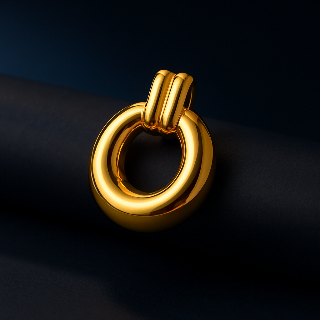 Gold ring pendant on a dark background
