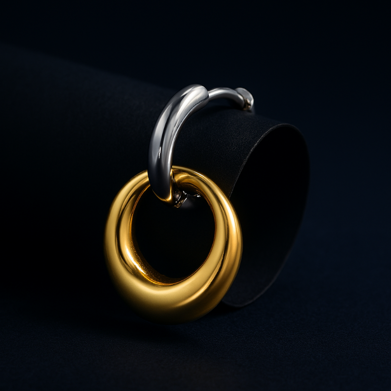 Gold and silver ring design on a black background