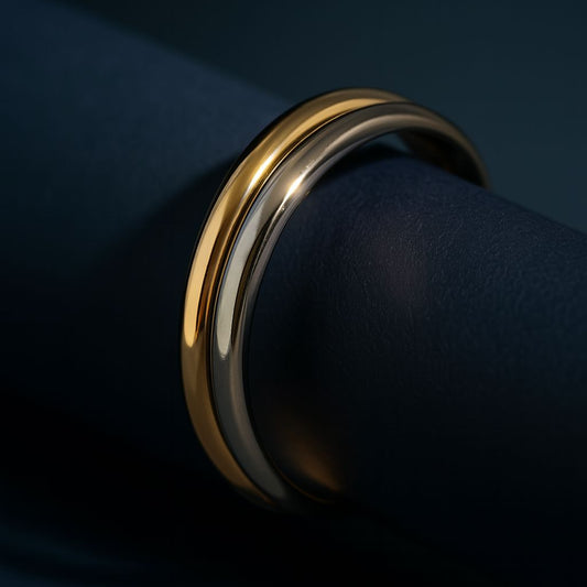 Gold ring on a dark blue fabric background