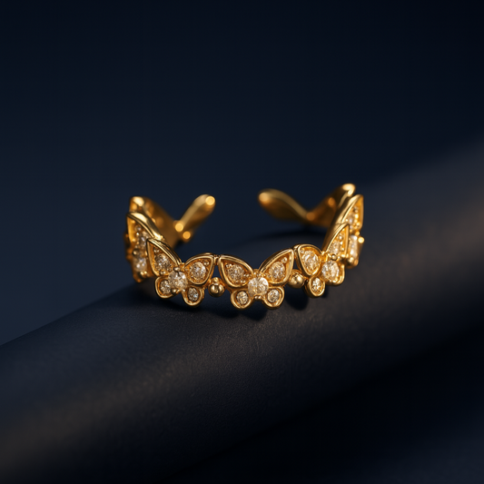 Gold bracelet with intricate design on a dark background