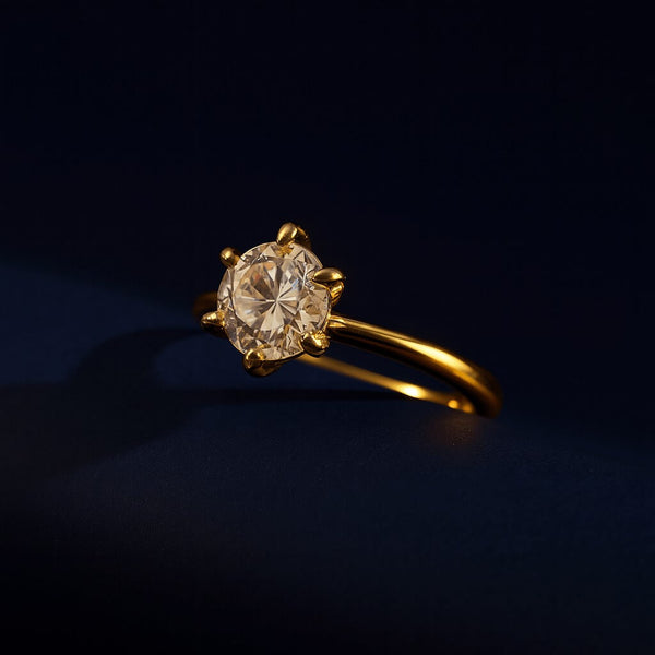 Gold ring with a diamond on a dark background- LAVISH JEWELS