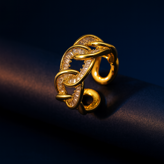 Gold ring with diamond accents on a dark background