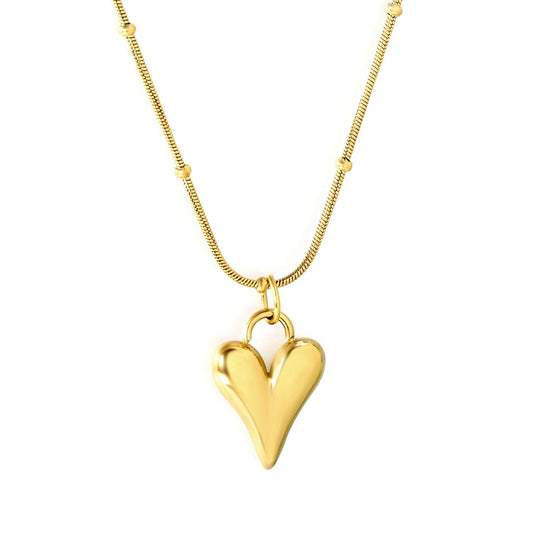 "Zeal Elongated Heart Necklace in 18K PVD gold plated stainless steel on white background"