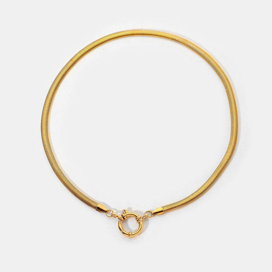 "Aurelia Snake Chain Choker with sailor clasp in 18K PVD gold plated stainless steel on white background"