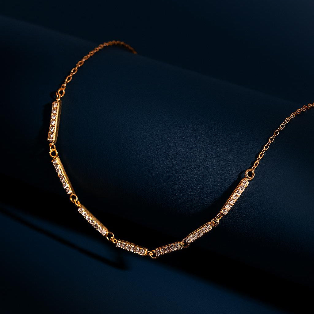 GOLVINA Gold Necklace with cubic zirconia bar link design – dark display background