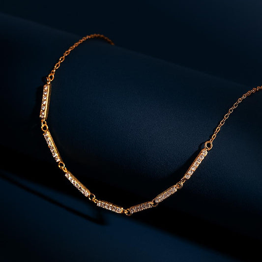 GOLVINA Gold Necklace with cubic zirconia bar link design – dark display background