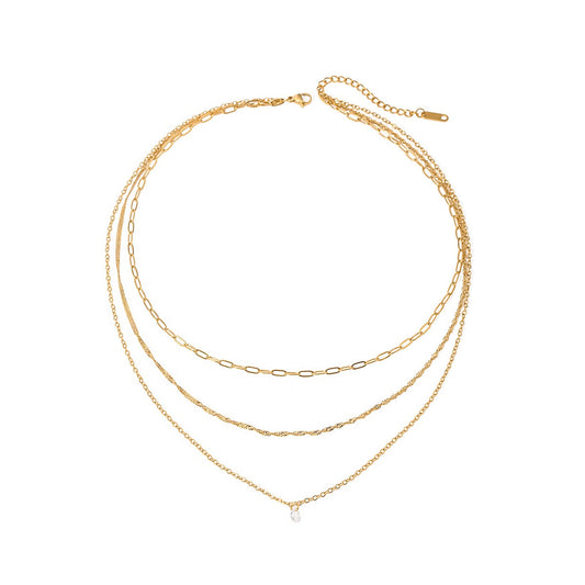 AURENE Gold Necklace with triple layered chains and zircon drop pendant – white background
