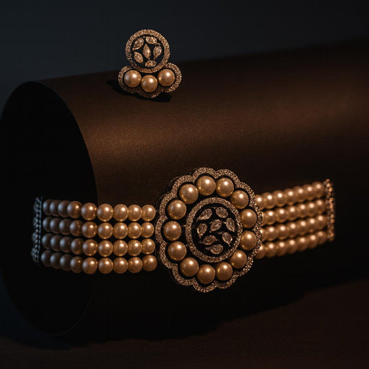  Velvet Charmes choker and earring displayed on a black matte roll with moody lighting