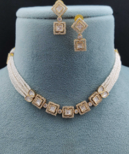  Dolce pearl kundan necklace with matching square drop earrings on teal velvet bust