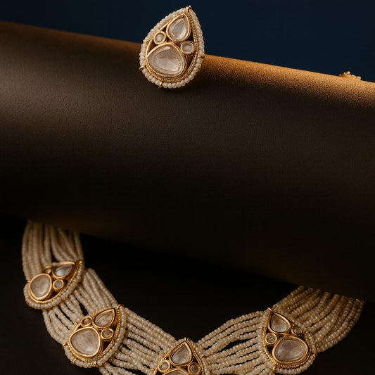 Editorial luxury image of Bianca necklace and earring on black setup