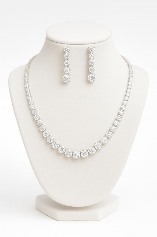 Studio shot of necklace and earrings on white bust with white background