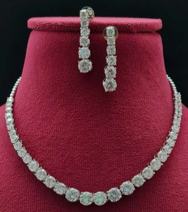 Front view of Solitaire CZ necklace set on red velvet bust

