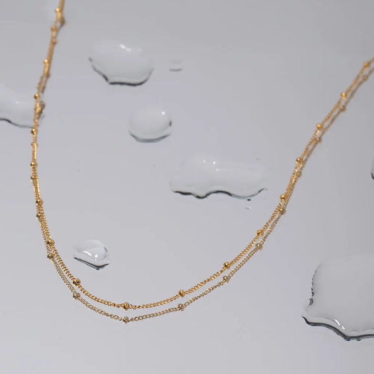 OCEANIC GOLD NECKLACE LAVISH JEWELS
